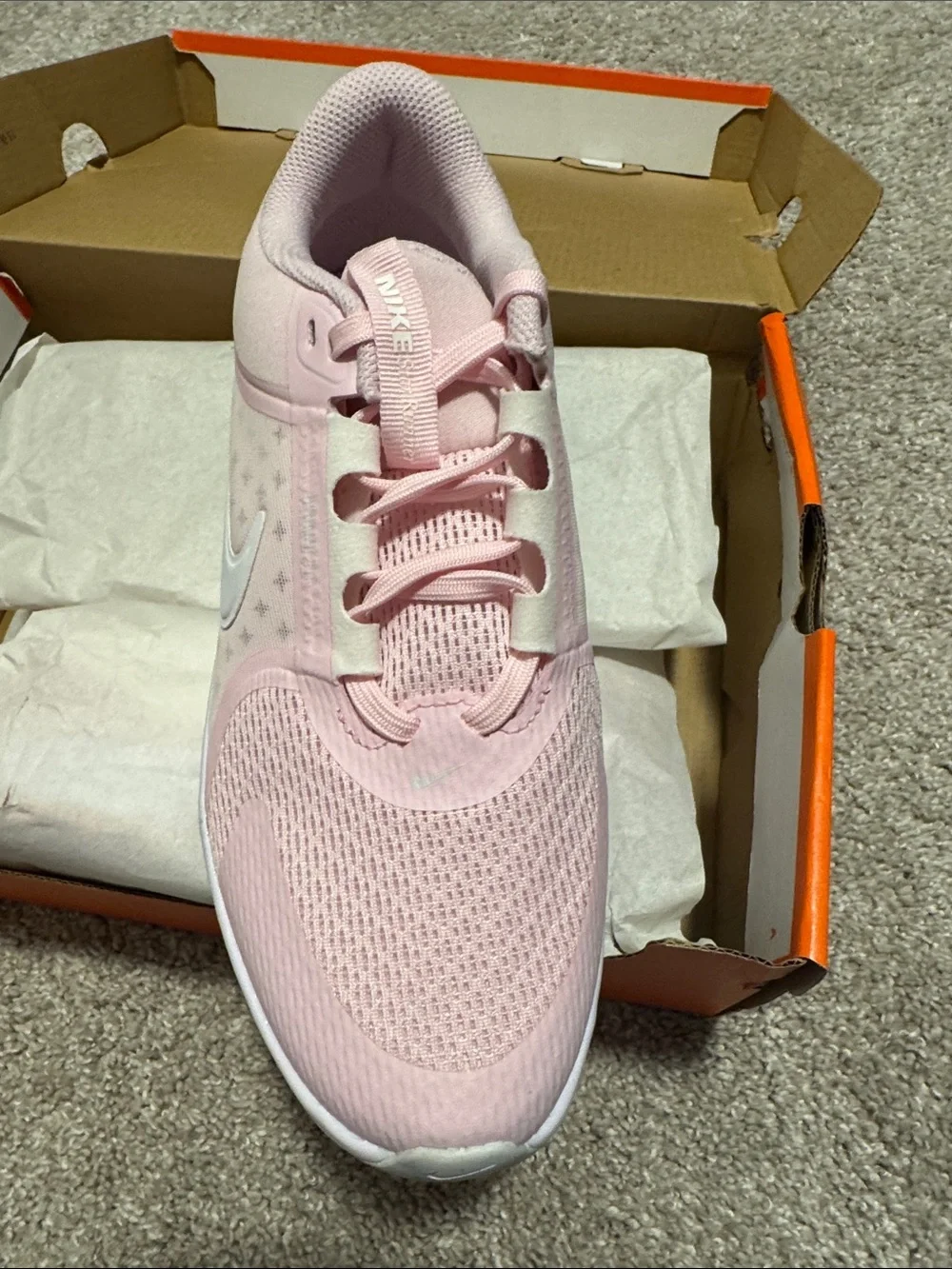 Nike Women’s Light Pink Athletic Sneakers with White Swoosh